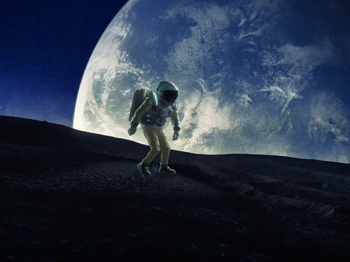 Astronaut looking up at a glowing planet from a rocky surface — placeholder cover art